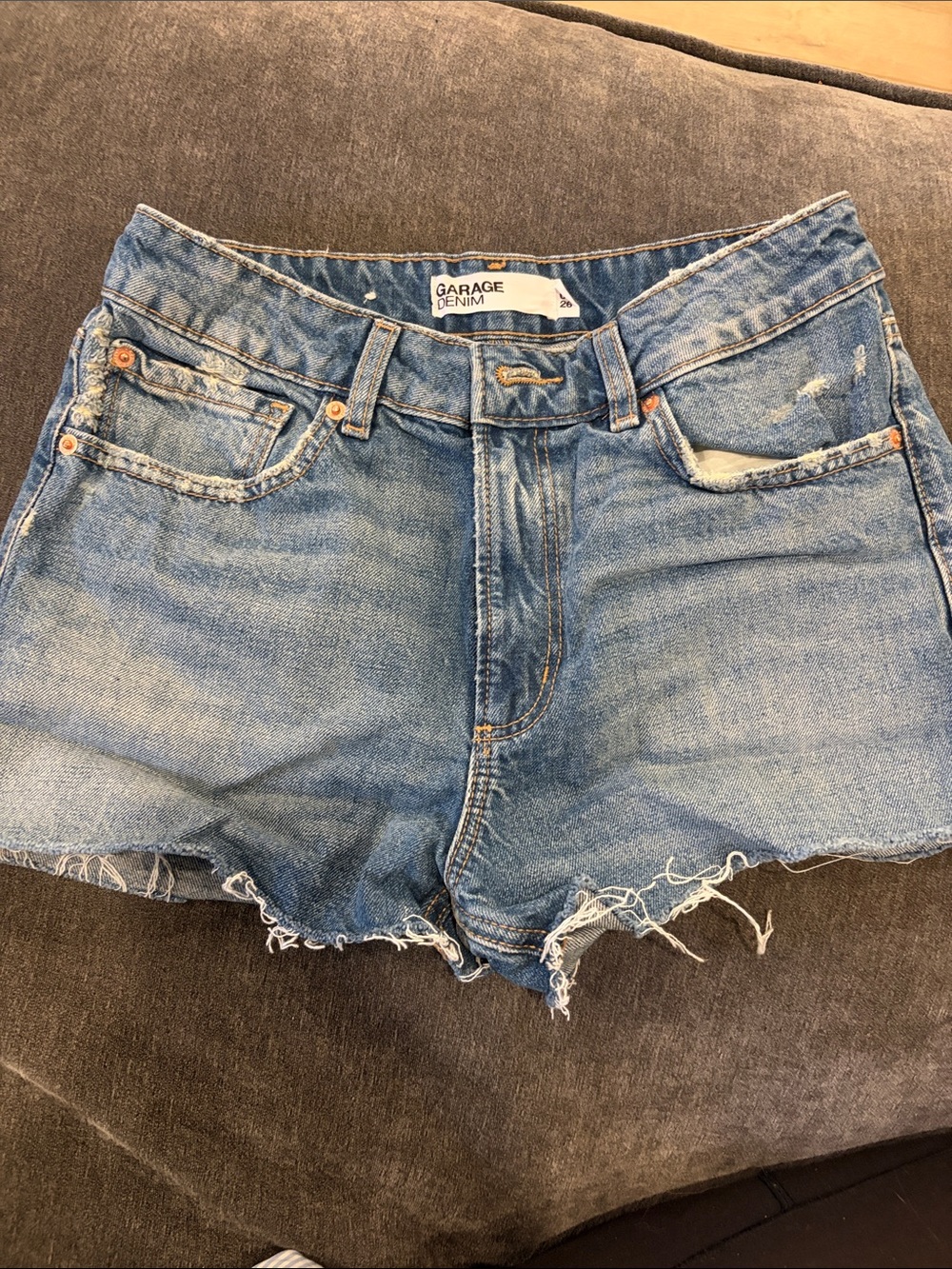 Garage Denim Cutoff Shorts in Light Blue Wash - Picture 1 of 3